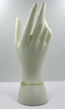 Load image into Gallery viewer, 18k yellow gold traveler rolo bracelet 6.7" with flat plane and world map