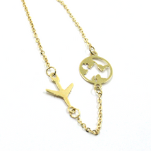 Load image into Gallery viewer, 18k yellow gold traveler rolo bracelet 6.7" with flat plane and world map