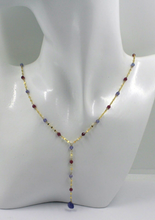 Load image into Gallery viewer, 18k yellow gold oval lariat necklace with 3mm faceted red ruby blue tanzanite