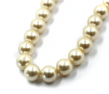 Load image into Gallery viewer, 18k yellow gold 24" necklace with 7mm perfect synthetic champagne round pearls