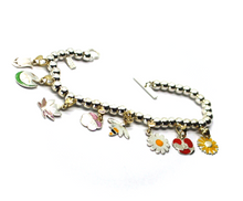 Load image into Gallery viewer, BRACELET & VIOLET WATER LILY TULIP POPPY SUNFLOWER LOTUS DAISY 9K GOLD PENDANTS.