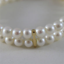 Cargar imagen en el visor de la galería, 18k yellow gold bracelet with two strands white fw pearls 7.08 in made in Italy.
