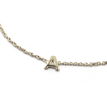 Cargar imagen en el visor de la galería, 18k white gold rolo thin bracelet with central small 5mm letter initial A.