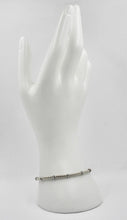 Load image into Gallery viewer, 18k white gold elastic bracelet, alternate 3mm basket popcorn tube, worked discs.
