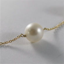 Load image into Gallery viewer, 18k yellow gold necklace with round white freshwater pearls made in Italy.