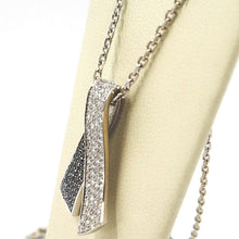 Charger l'image dans la galerie, 18k white gold necklace hug bow pendant white black diamonds, diamond cut chain.