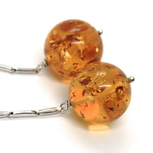 Load image into Gallery viewer, 18k white gold pendant earrings, big orange amber 18 mm spheres, 2.7 inches.