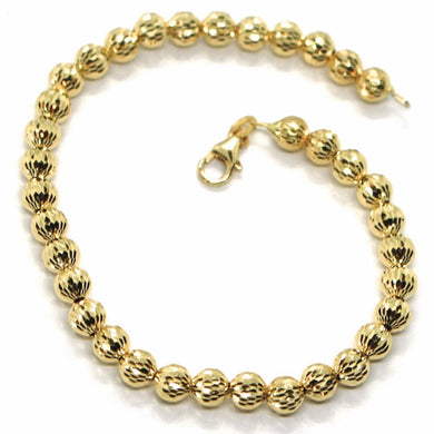 18k yellow gold bracelet 19 cm, finely worked spheres big 5 mm diamond cut balls.