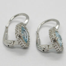 Cargar imagen en el visor de la galería, 18k white gold leverback earrings cushion blue topaz, zirconia frame.