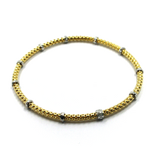 Load image into Gallery viewer, 18k yellow white gold elastic bracelet, 3mm basket popcorn tube, worked discs.
