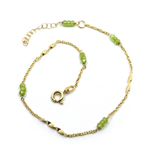 Load image into Gallery viewer, 18k yellow gold rolo spiral anklet 9.8" 25cm with faceted green 3mm peridot.