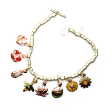 Load image into Gallery viewer, BRACELET & VIOLET WATER LILY TULIP POPPY SUNFLOWER LOTUS DAISY 9K GOLD PENDANTS.