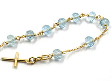 Load image into Gallery viewer, 18k yellow gold rosary bracelet, oval faceted aquamarine, mini tube Cross.
