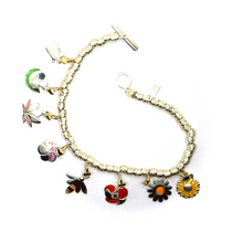 Load image into Gallery viewer, BRACELET & VIOLET WATER LILY TULIP POPPY SUNFLOWER LOTUS DAISY 9K GOLD PENDANTS.