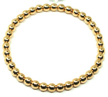 Cargar imagen en el visor de la galería, 18k yellow gold bracelet, semirigid, elastic, big 5 mm smooth balls spheres.