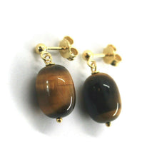 Cargar imagen en el visor de la galería, 18k yellow gold 23mm pendant earrings with 15mm oval cylinder tiger eye.