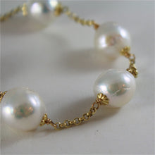Load image into Gallery viewer, 18k yellow gold bracelet with very shiny baroque pearls 8.25 in made in Italy.