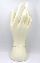 Cargar imagen en el visor de la galería, 18k rose gold rolo thin bracelet with central small 5mm letter initial L.