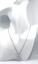 Load image into Gallery viewer, 18k white gold emerald aquamarine 3 ct trilogy pendant & venetian chain necklace.