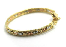 Load image into Gallery viewer, 18K YELLOW WHITE ROSE GOLD BRACELET, SEMIRIGID, FINELY WORKED, FACETED TUBES.