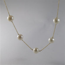 Load image into Gallery viewer, 18k yellow gold necklace with round white freshwater pearls made in Italy.
