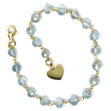 Load image into Gallery viewer, 18k yellow gold bracelet, oval faceted aquamarine, flat heart pendant.