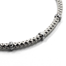 Load image into Gallery viewer, 18k white gold elastic bracelet, alternate 3mm basket popcorn tube, worked discs.