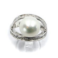 Load image into Gallery viewer, 18k white gold doble crossed ring, big australian 12mm pearl and diamonds frame.