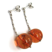 Load image into Gallery viewer, 18k white gold pendant earrings, big orange amber 16 mm spheres, 1.8 inches.