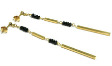 Charger l'image dans la galerie, 18k yellow gold pendant earrings, black spinel, double tube, length 3 inches.