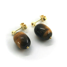 Cargar imagen en el visor de la galería, 18k yellow gold 23mm pendant earrings with 15mm oval cylinder tiger eye.