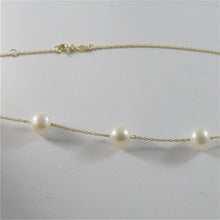 Load image into Gallery viewer, 18k yellow gold necklace with round white freshwater pearls made in Italy.