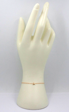 Cargar imagen en el visor de la galería, 18k rose gold rolo thin bracelet with central small 5mm letter initial A.