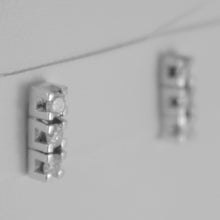Cargar imagen en el visor de la galería, 18k white gold trilogy 9 mm earrings round diamonds 0.30 carats, made in Italy.