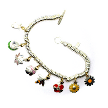 Load image into Gallery viewer, BRACELET & VIOLET WATER LILY TULIP POPPY SUNFLOWER LOTUS DAISY 9K GOLD PENDANTS.