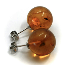 Load image into Gallery viewer, 18k white gold lobe earrings orange big amber 15mm spheres butterfly closure.