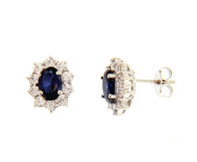 Cargar imagen en el visor de la galería, 18k white gold flower earrings oval blue crystal and cubic zirconia frame 13mm.