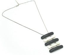 Load image into Gallery viewer, 18k white gold lariat necklace black white onyx and mother of pearl bar pendant.