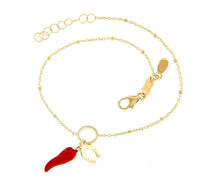 Load image into Gallery viewer, 18K YELLOW GOLD 7.1" BRACELET WITH 12mm RED ENAMEL HORN CORNICELLO AND HORSESHOE PENDANT.