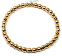 Charger l'image dans la galerie, 18k rose gold bracelet, semirigid, elastic, big 5 mm smooth balls spheres.