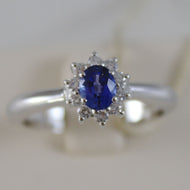 18K WHITE GOLD FLOWER RING, DIAMOND & OVAL BLUE SAPPHIRE, 0.65