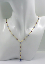 Load image into Gallery viewer, 18k yellow gold oval lariat necklace with 3mm faceted red ruby blue tanzanite
