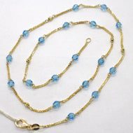 COLLAR ORO AMARILLO 18K OREJA CUADRADA ALTERNATIVA CON BOLAS AZULES FACETADAS 4 MM