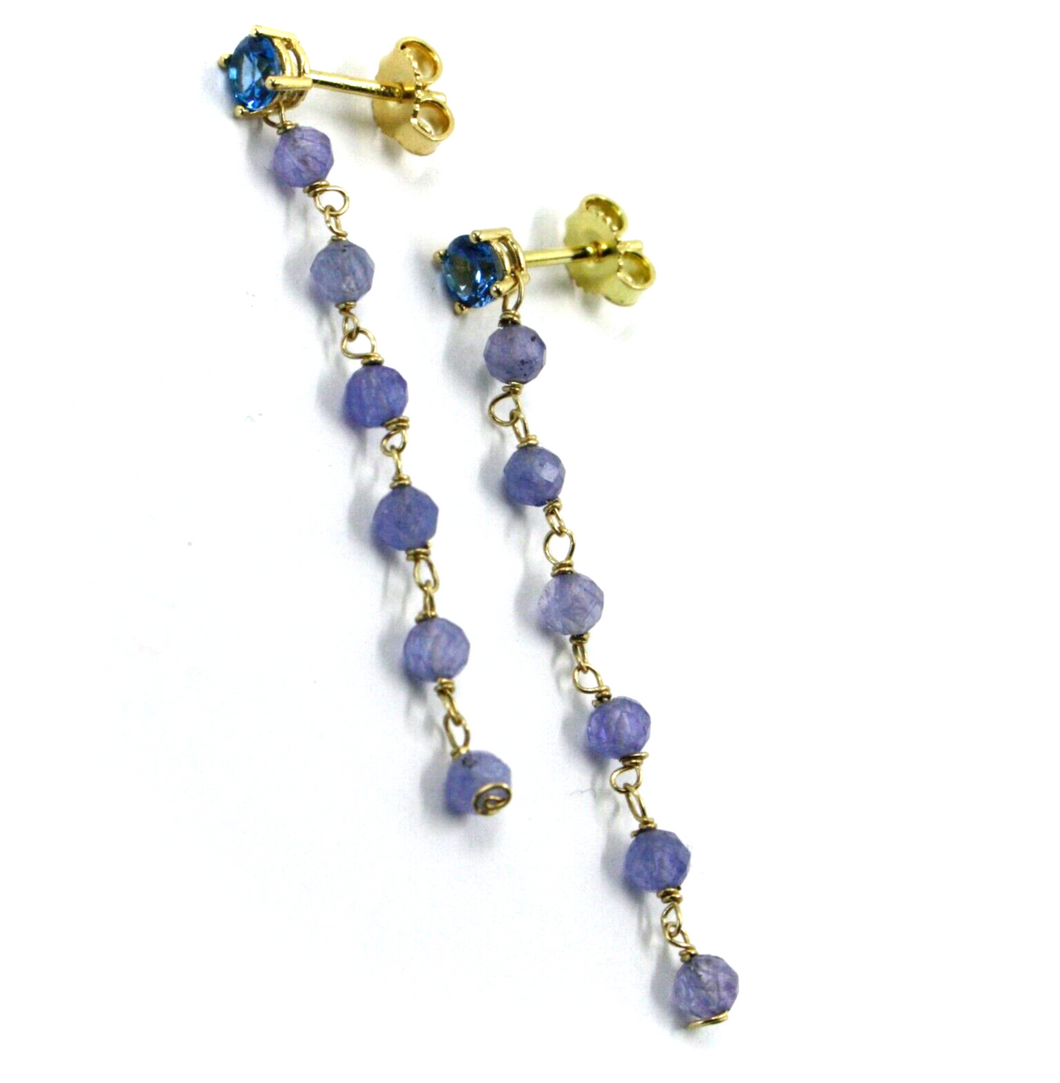 Pendientes de oro amarillo de 18k de 4,2cm de largo, tanzanita de 3,5mm y circonita azul de 4mm. 