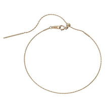 Cargar imagen en el visor de la galería, PULSERA RÍGIDA DE ORO AMARILLO DE 18 QUILATES CON ELÁSTICO TRABAJADO, ALAMBRE FINO DE 0,5 MM, AJUSTABLE
