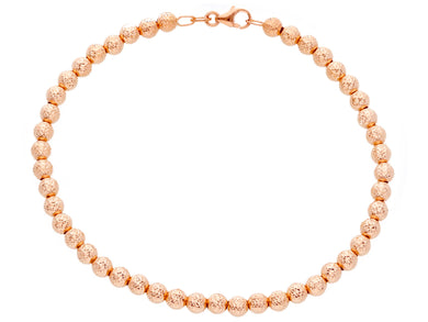 18k rose gold bracelet 19cm worked spheres 4mm diamond cut balls.