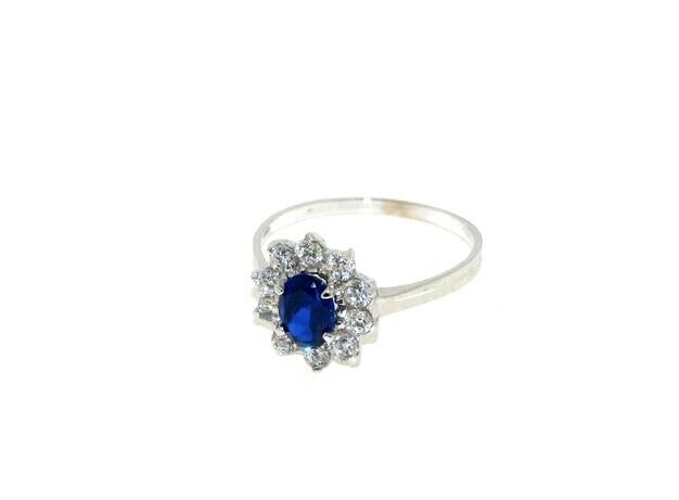 18k white gold flower ring oval blue crystal and cubic zirconia frame.