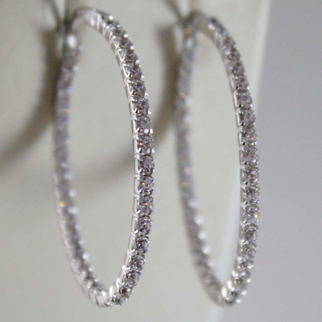 18k white gold earrings oval hoop 24 mm diameter, zirconia 3.00 ct.