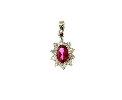 18k white gold flower pendant with oval red crystal and cubic zirconia frame.