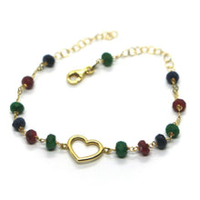 Load image into Gallery viewer, 18k yellow gold heart bracelet, faceted green emerald, red ruby, blue sapphire.
